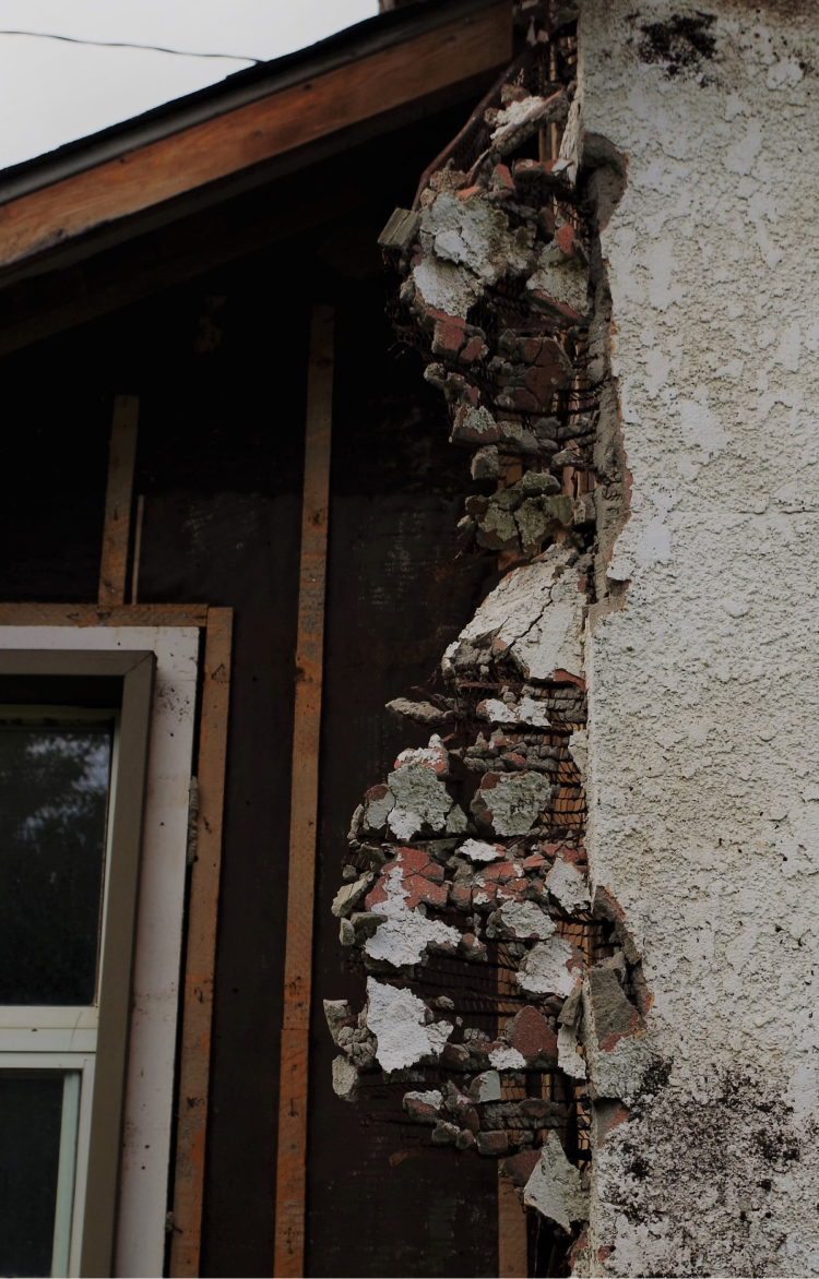 Crumbling wall with asbestos