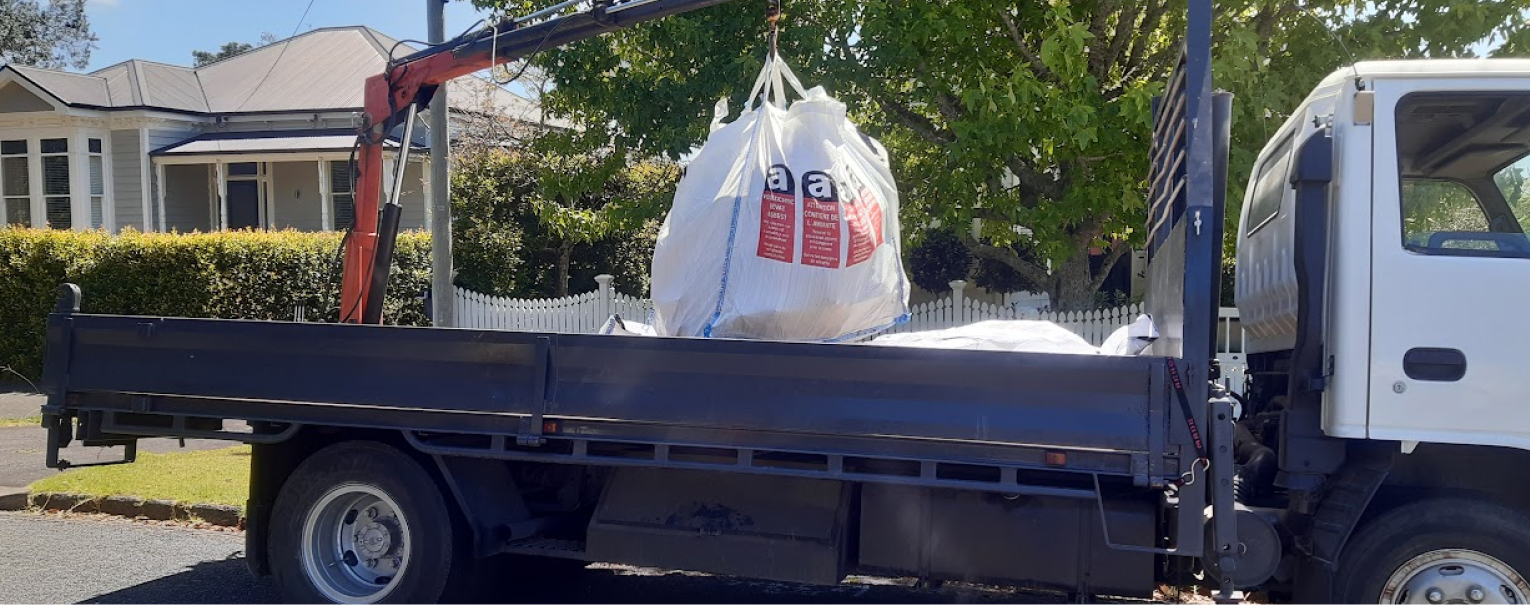 Truck carrying bag of asbestos